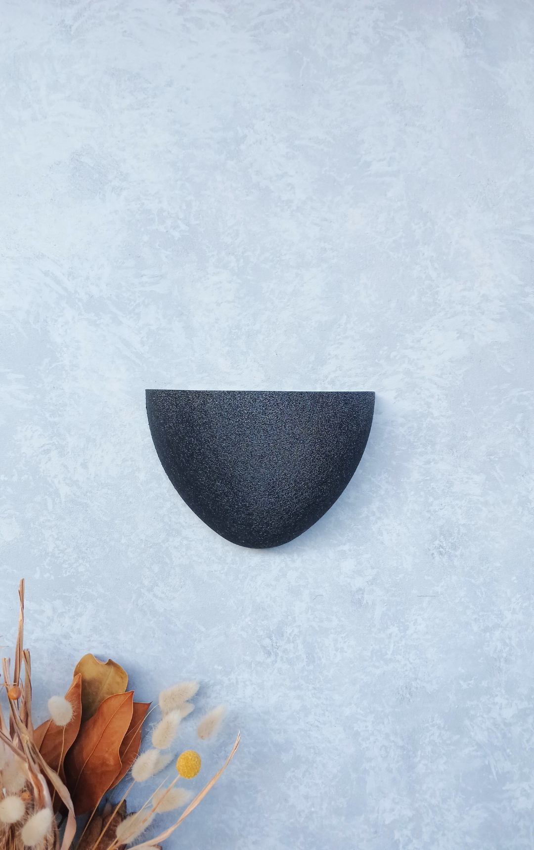 Classic Black Gecko Planter without plant, showing its minimalist design as a piece of home décor.