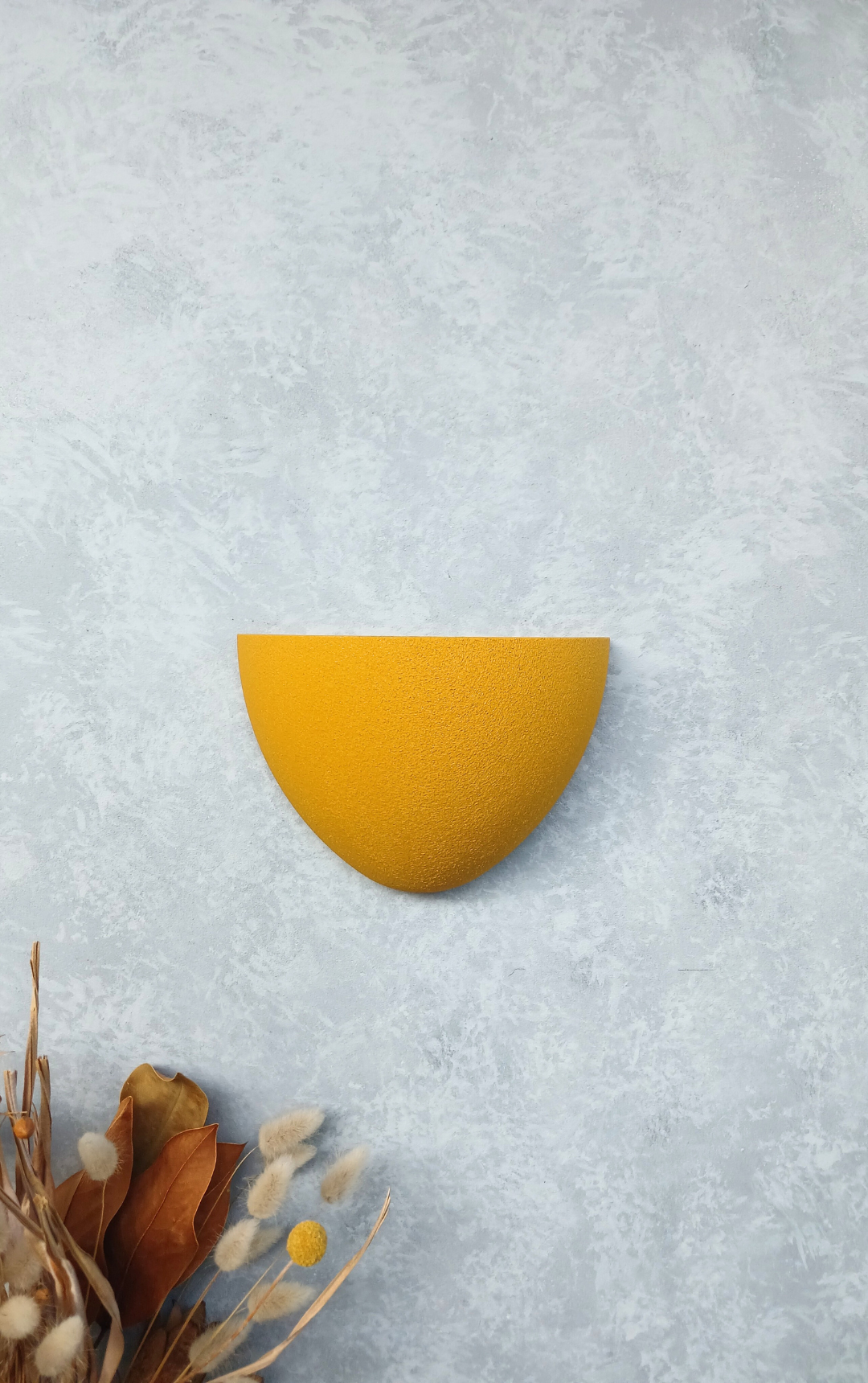 Classic Ochre Gecko Planter without a plant, a decorative indoor plant pot for small spaces.